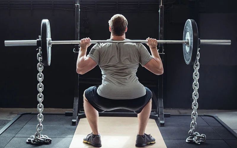 Squatting with Barbell Using Chains